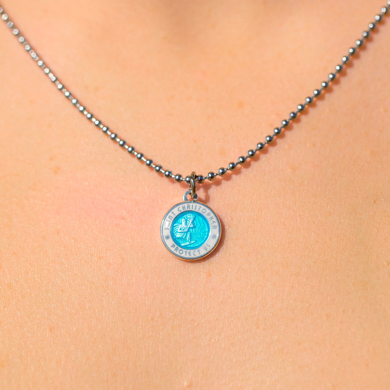 small st. christopher necklace in 
aqua white