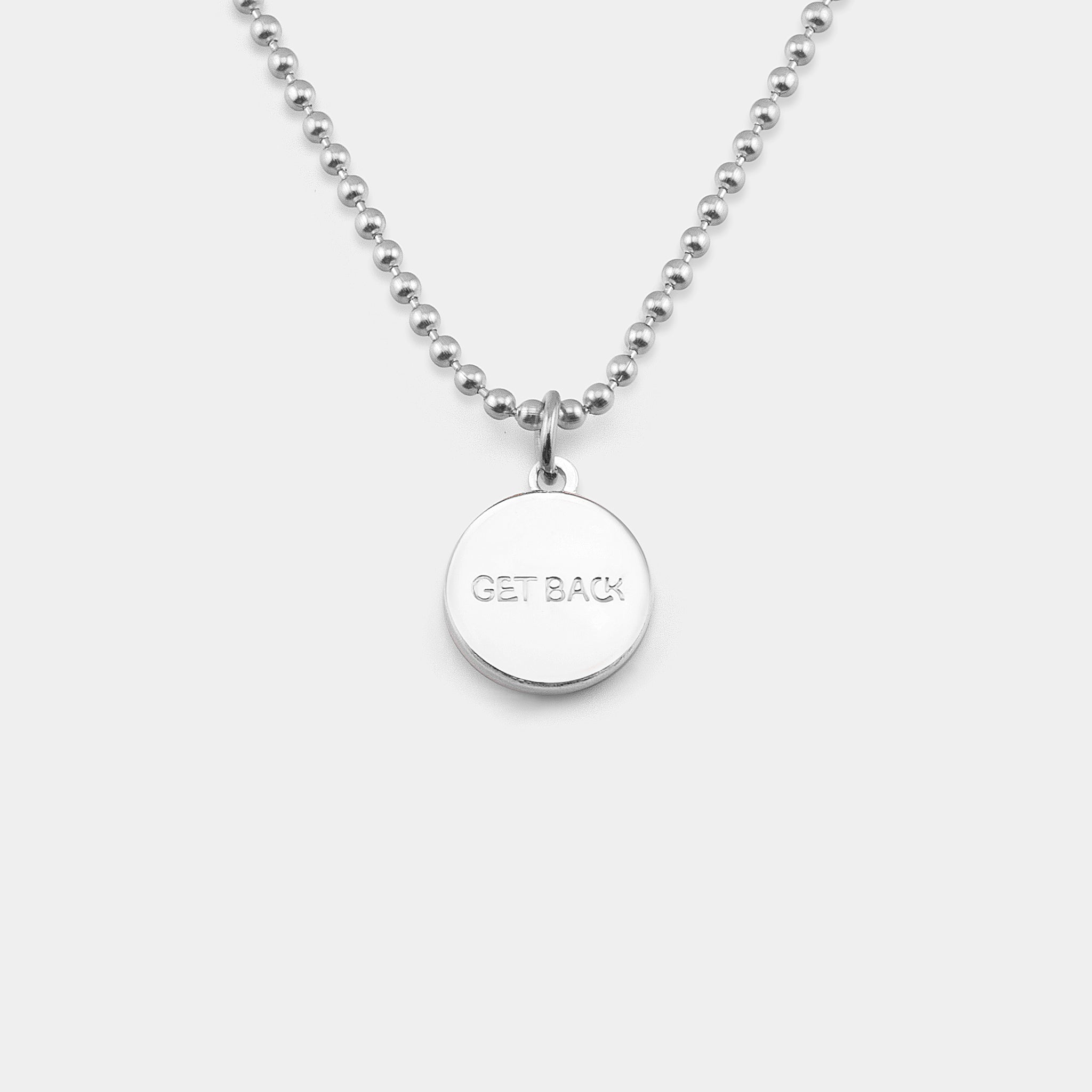 get back engraved on back of st. christopher pendant