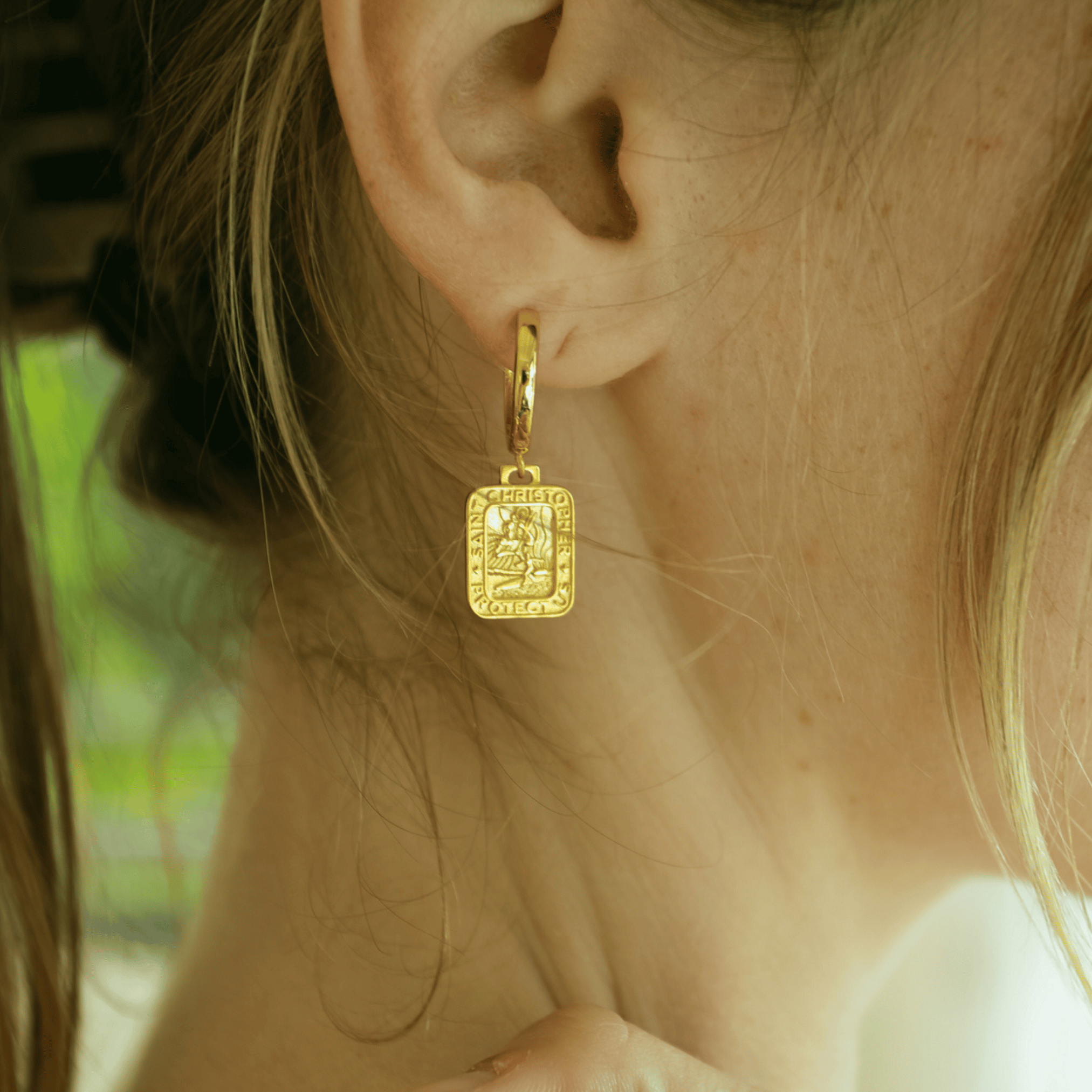 Gold Rectangle St. Christopher earrings with huggie hoop